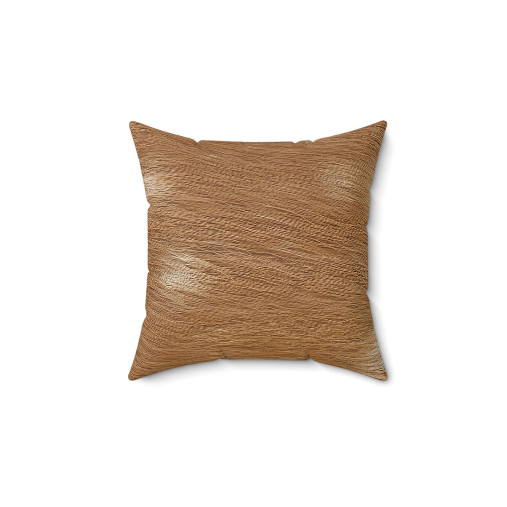 Fawn deer print pillow detail — creamy white dapples on russet tan