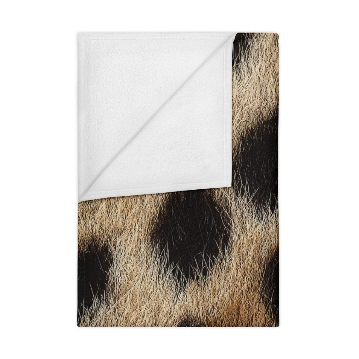 Classic cream leopard print toddler blanket in a neutral nursery