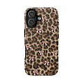 Coquette leopard print phone case with a pink ribbon bow, shown on iPhone 17