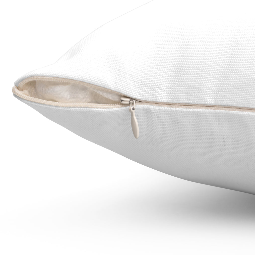 Fawn deer print pillow detail — creamy white dapples on russet tan