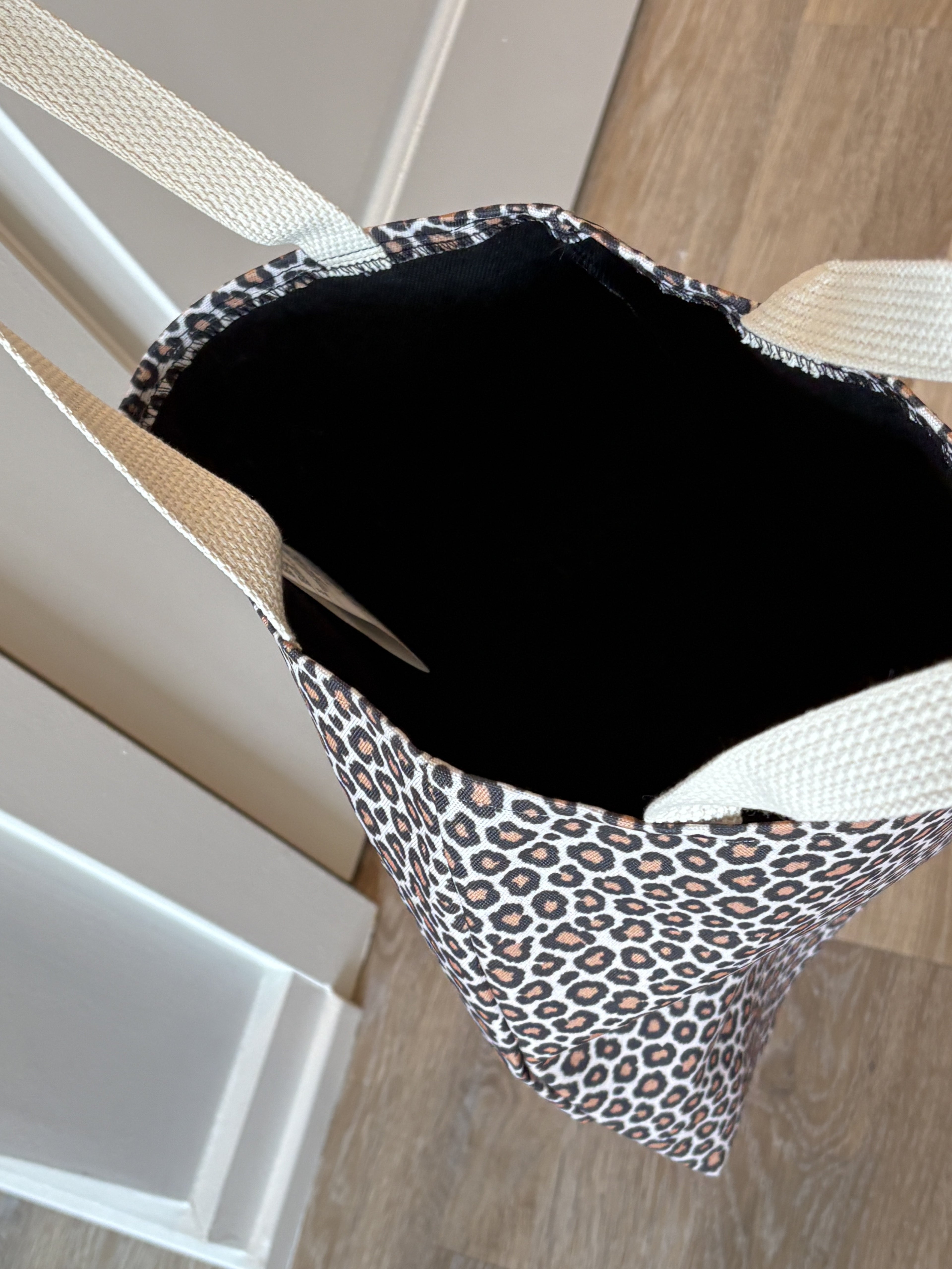 Tawny leopard print tote bag interior lining — real product photo