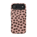 Close-up of photographic cheetah spots in soft pink on a tough case